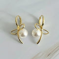 Boucles d'oreilles nœud et perle