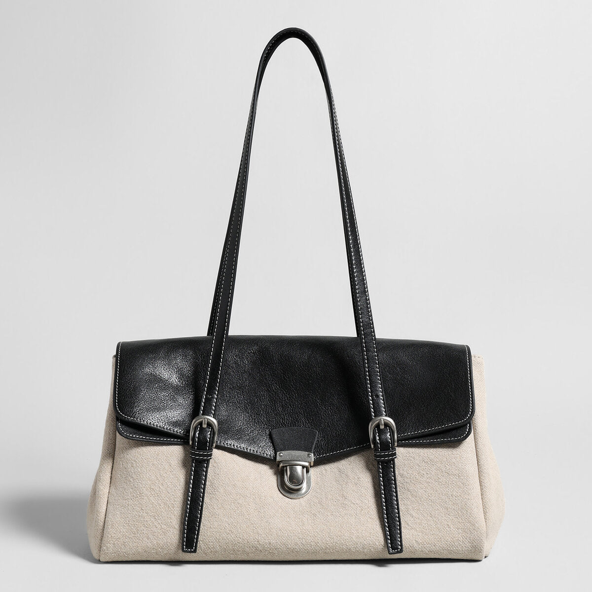 Sac cabas bicolore en toile et cuir de veau à rabat
