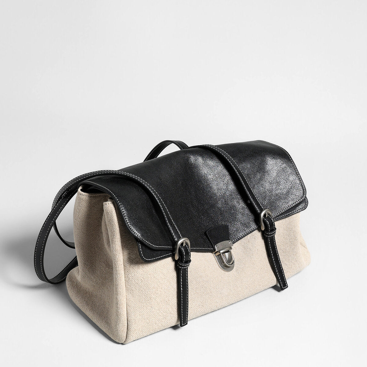 Sac cabas bicolore en toile et cuir de veau à rabat