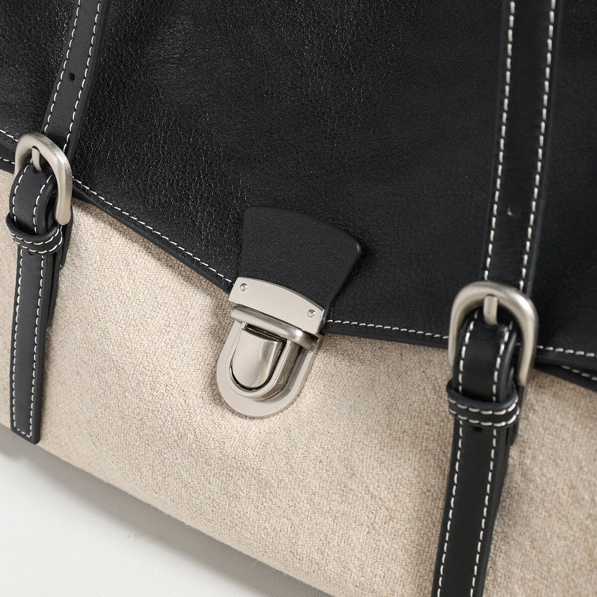 Sac cabas bicolore en toile et cuir de veau à rabat