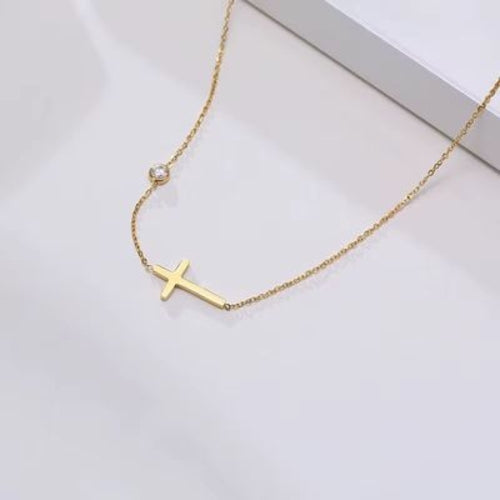 Bracelet / chaîne de cheville croix
